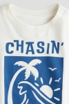 áo thun chasin màu trắng xanh cây dừa cho bé H&M 6m - 4y